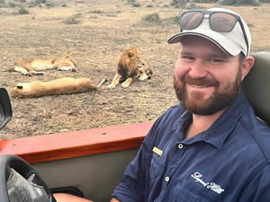 Leopard Hills ranger with lions